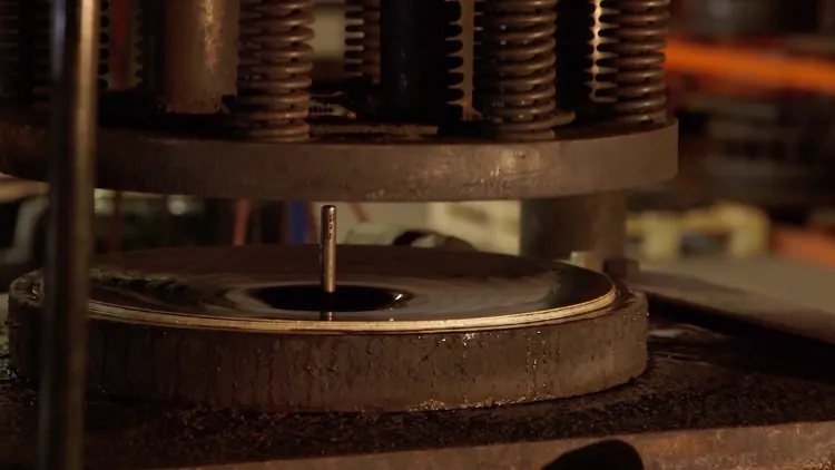 Hydraulic press forming the cymbal dome and bell